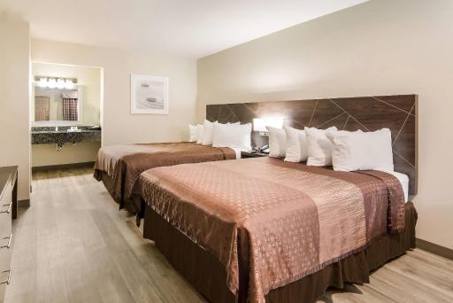 Quality Inn & Suites Dallas-Cityplace - Housity