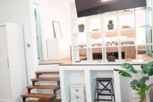 Fantabulous Downtown Abode w King Bed, 65" TV, Washer and Tumble Dryer - Housity