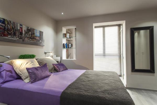 Cama o camas de una habitación en Elegant Eixample Apartment nicely decorated