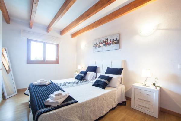 Cama o camas de una habitación en Sa Cova (Cova De Rotana)