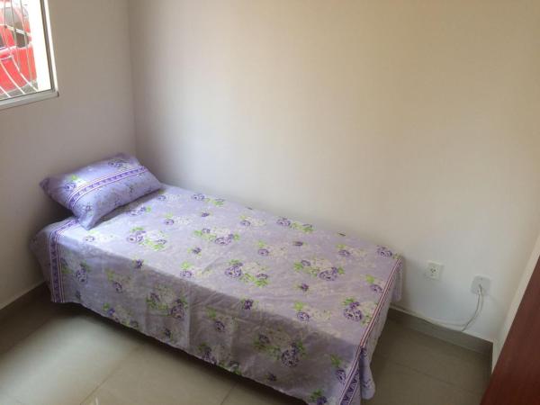 Cama o camas de una habitación en Excelente apartamento em Belo Horizonte