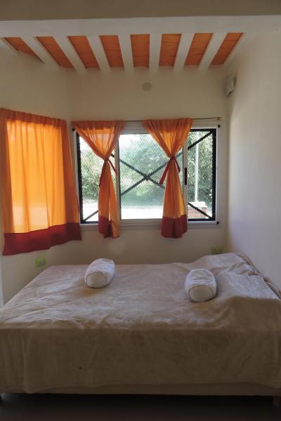 Cama o camas de una habitación en Valle Escondido