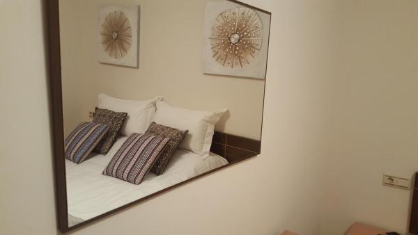 Cama o camas de una habitación en GLC Islantilla