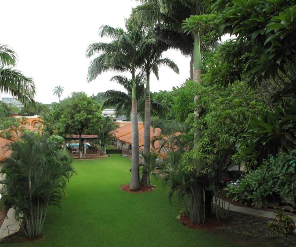 Jardín al aire libre en Palmareca Inn-Suites-Loft