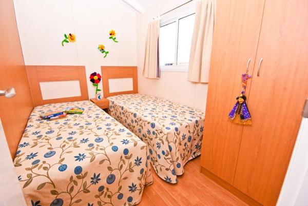 Cama o camas de una habitación en Camping La Torreta
