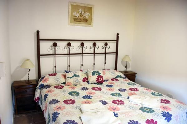 Una cama o camas en una habitación de Cabanes Antu Kuyen