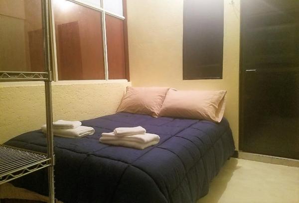 Cama o camas de una habitación en C huéspedes Sn Angel Home - confirme reservacion al telefono siempre -