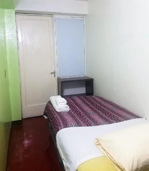 Cama o camas de una habitación en C huéspedes Sn Angel Home - confirme reservacion al telefono siempre -