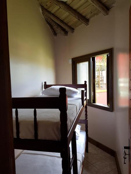 A bunk bed or bunk beds in a room at Villa Suzana