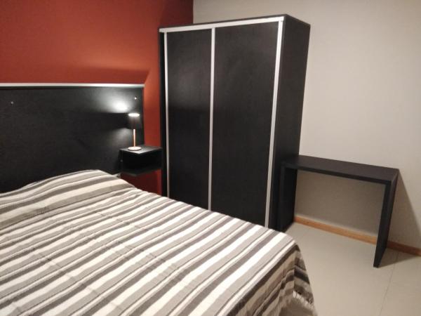 Cama o camas de una habitación en Magenta Departamentos