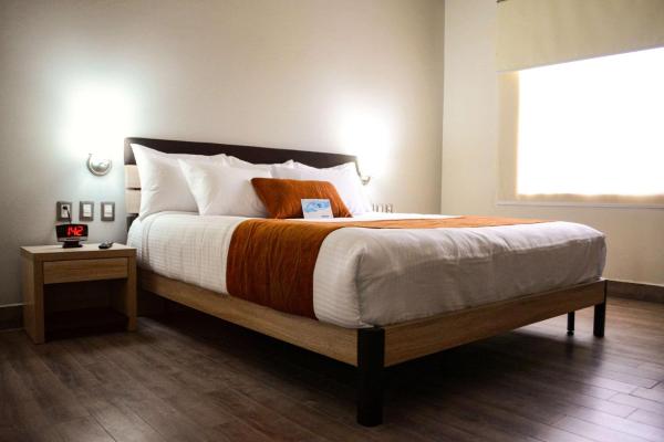 Cama o camas de una habitación en Comfort Inn Irapuato