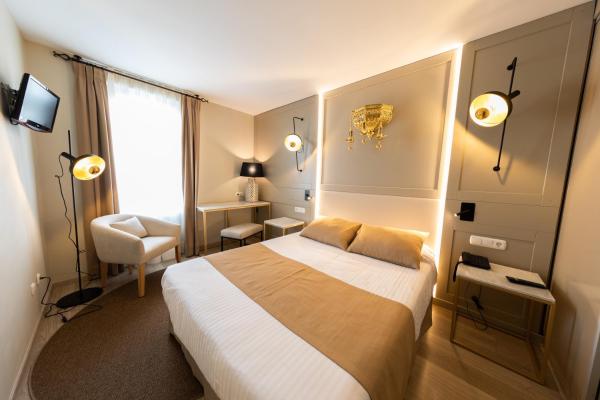 Cama o camas de una habitación en Hotel Casablanca
