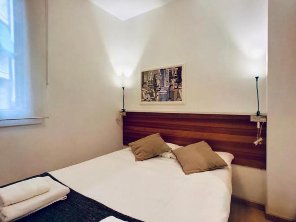 Cama o camas de una habitación en Bed&BCN Gracia II