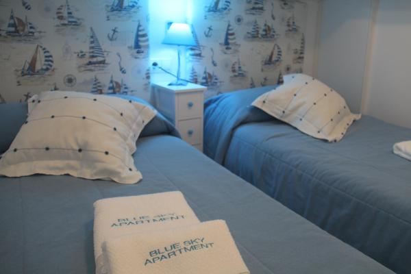 Cama o camas de una habitación en Blue Sky apartment