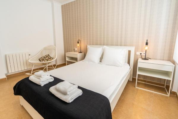Cama o camas de una habitación en Trendy Homes Puerta Purchena
