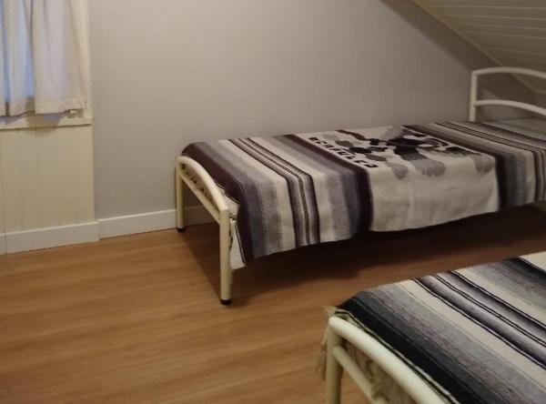 Cama o camas de una habitación en Apartamento Família Sirangelo