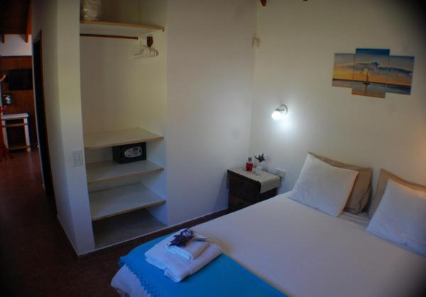Cama o camas de una habitación en Cabaña Buscar Delmar