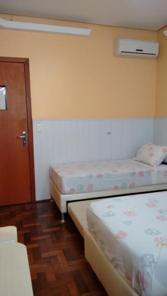 Cama o camas de una habitación en Hotel Ivo De Conto