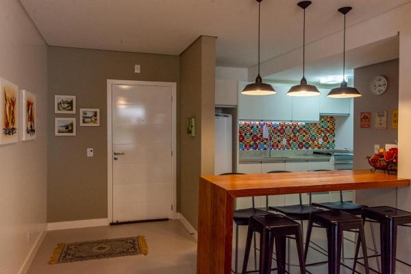 A kitchen or kitchenette at Apartamento completo na Paradisíaca Praia dos Ingleses