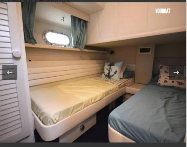 Cama o camas de una habitación en Beautiful Kiwi Boat
