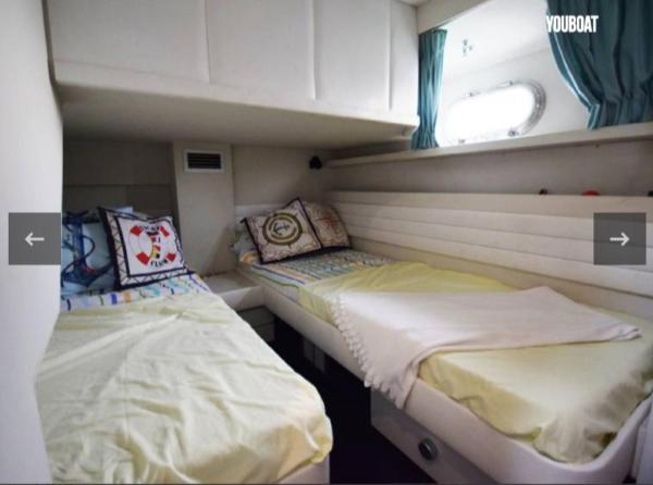 Cama o camas de una habitación en Beautiful Kiwi Boat