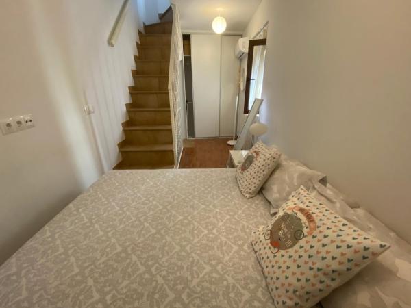 Cama o camas de una habitación en Casa Céntrica con Wifi Gratis