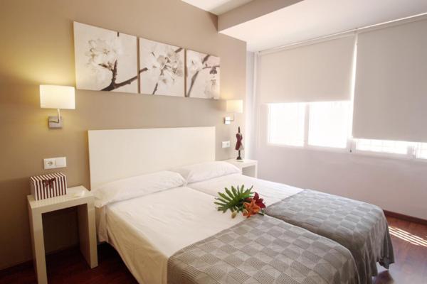 Cama o camas de una habitación en Dormavalencia Hostel Reino