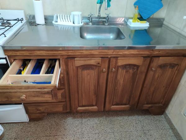 a kitchen counter with a sink and a sink at Departamento céntrico en Santa Fe capital in Santa Fe