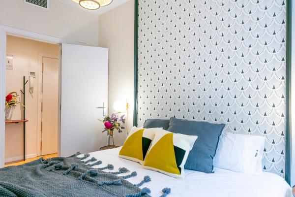 Cama o camas de una habitación en Luxury Belmont Puerta del Sol