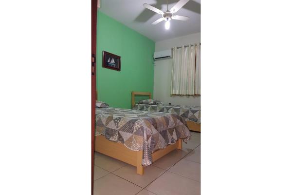 Cama o camas de una habitación en Charlotta apartamento 201 - Apartamento na Praia de 4 Ilhas