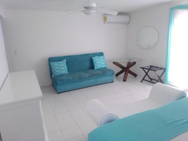 Zona de estar de Cancún Apartamento excepcional, amplio y encantador, excelente ubicación