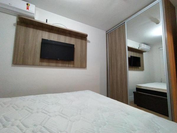 Cama o camas de una habitación en 2 Quartos com Piscina Aquecida Melhor Bairro Brasília