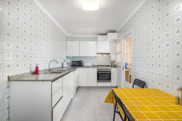 Una cocina o zona de cocina en Apartamento Hawaii