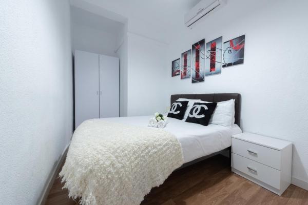 Cama o camas de una habitación en Apartamentos Day Madrid SILVA Centro Gran Via Sol Malasaña