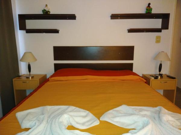 Cama o camas de una habitación en La Loma