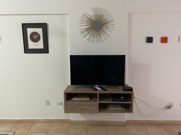 Una televisión o centro de entretenimiento en Apartamento Alta Córdoba