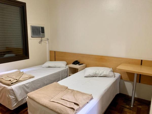 Cama o camas de una habitación en Colossi Hotel