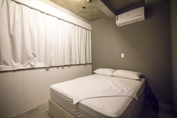 Cama o camas de una habitación en Joy Hostel & Suítes