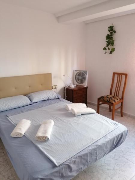 Cama o camas de una habitación en PISO EN MALVARROSA