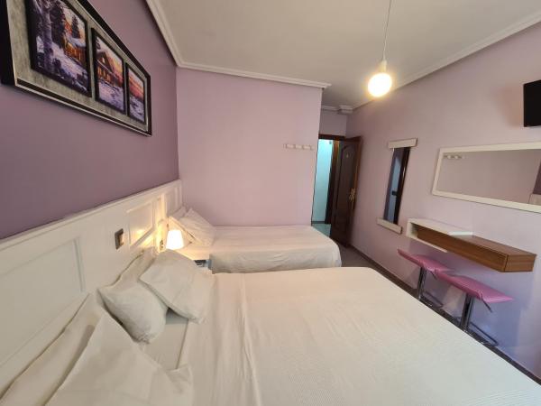 Cama o camas de una habitación en CH Chelo