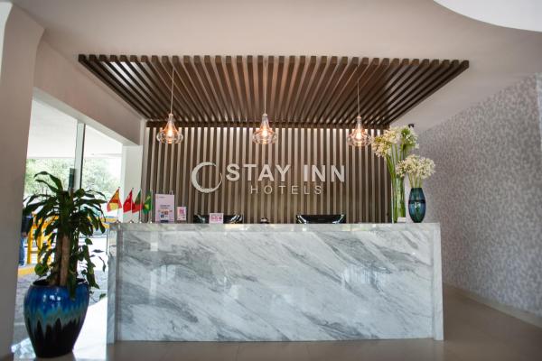 El vestíbulo o zona de recepción de Stay Inn Hotels
