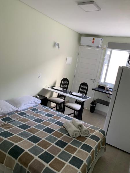 Cama o camas de una habitación en Villa Stellino Suítes