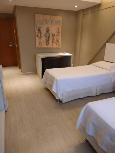 Cama o camas de una habitación en Hotel Manta