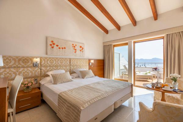 Cama o camas de una habitación en el Hotel Miramar