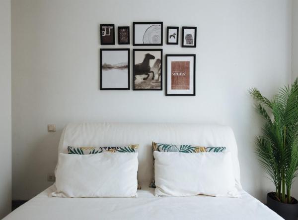 Cama o camas de una habitación en Bright and Familiar Apartment in Alameda