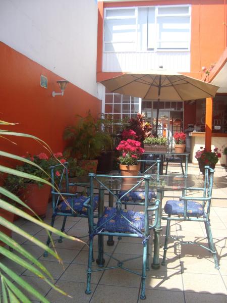 Un restaurante o sitio para comer en Hotel Camba
