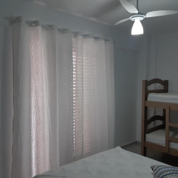 Cama o camas en una habitación de Apartamento Praia Grande - Ocian