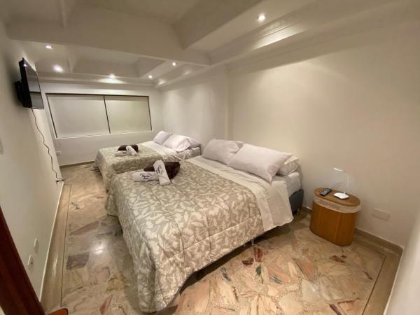 Cama o camas de una habitación en Casa Hotel Santa Ana Cedritos