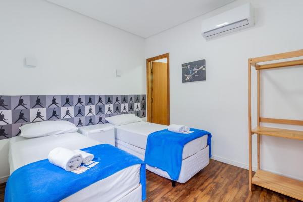 Cama o camas de una habitación en VivApp Rock CGH Suites - Aeropuerto de Congonhas