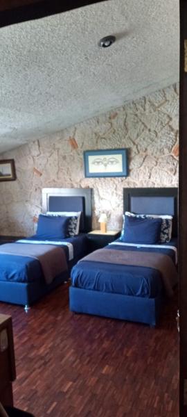 Cama o camas de una habitación en Habitación amplia cerca de Andares